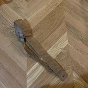 Beautiful never used embossed leather guitar strap